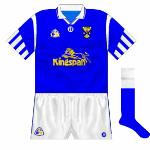 1995:
A return to O'Neills resulted in the donning of what was a fairly ubiquitous design, incorporating 'half-striped' sleeves. Worn during the run to the Ulster final, where Cavan lost to Tyrone. Kingspan, still sponsoring the county, was the new name on the shirt.