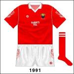 Two weeks after the Waterford game, Cork footballers played Kerry. With sponsorship allowed now, for this game and the Munster hurling final and replay loss to Tipperary the name of local company Barry's Tea featured on the jerseys.