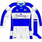 2005:
Coinciding with the Laois County Board copyrighting a new crest, Azzurri launched a new design, with the hurlers and footballers having the same sponsors. Early versions did not feature the crest on the sleeve as planned, however.