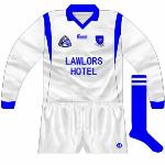 1996:
Three-Stripe International used to make adidas products under licence in Cork, but when that agreement ended they made clothes carrying the Emerald Active Wear. Waterford footballers, along with Kerry, were one of the few GAA teams to wear Emerald kits, with a standard design used.