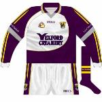 2006: 
Followed the design of the outfield version in purple and white, with gold reduced to just a trim colour while grey was also included for some reason.