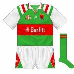 1995:
A real oddity among the Mayo canon was the outfit used in 1995. Though the design was largely similar to before, the sleeves were now white with green and red stripes. Genfitt took over from Univet as sponsors.