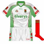 2005:
Despite Mayo having worn red against Kerry in the league, both sides lined out in predominantly green for the All-Ireland quarter-final. A few weeks later, however, Mayo minors wear white against the Kingdom.